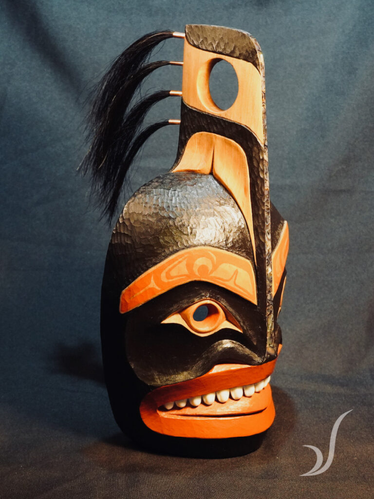 Hand carved Tlingit killer whale mask titled Child of Natsilane